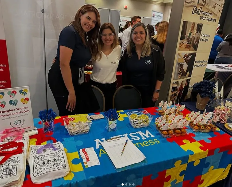 BSS Therapy Service team at Autism Awareness event booth
